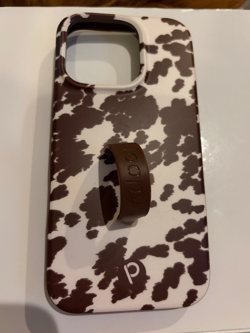 Loopy Phone Case with Brown Cow Print and Ring Grip iPhone 16 Pro